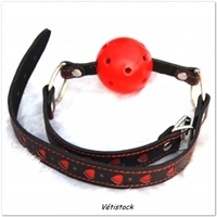 Accessoire BDSM baillon boule rouge avec collier petit coeur rouge