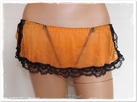 String jupette en voile orange recouvert de dentelle noir